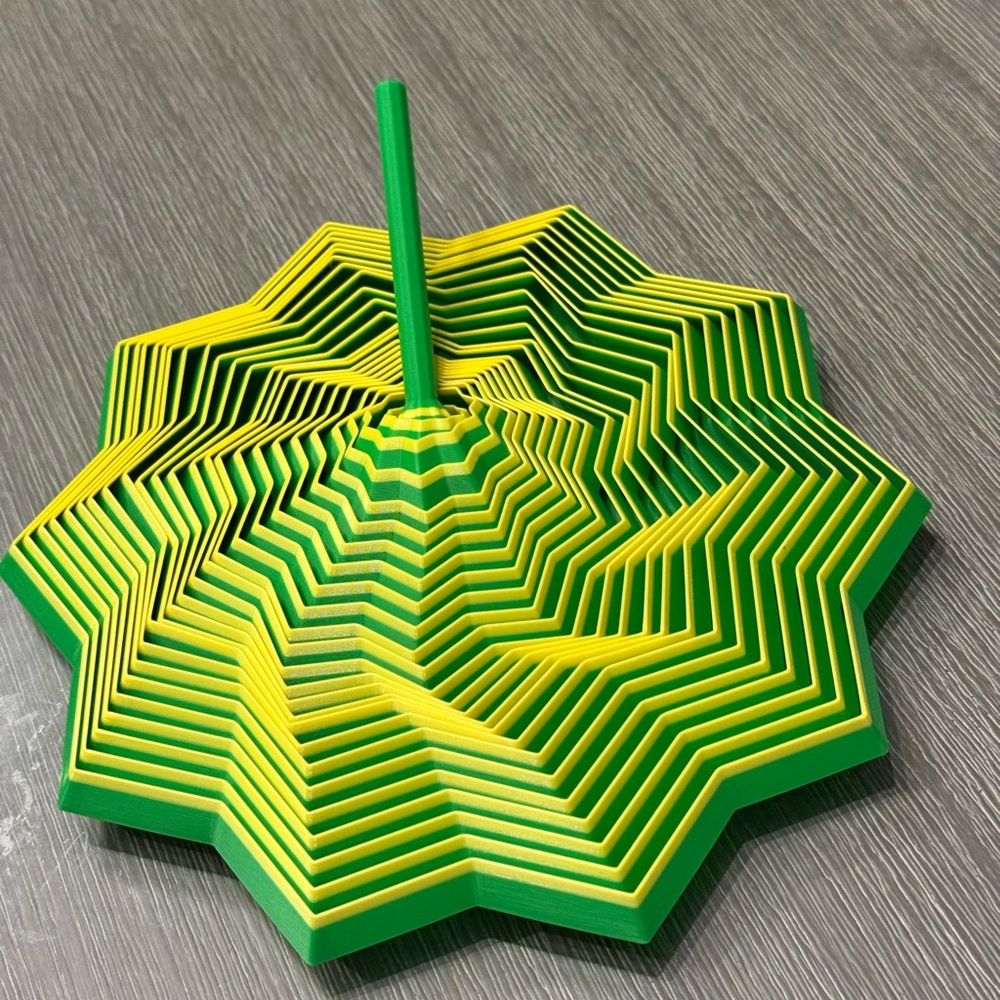 Vibrant Green and Yellow collapsible fidget star